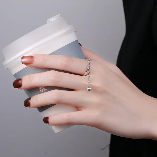 Bague à pompon réglable et simple